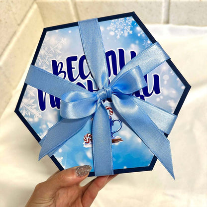 Geschenkbox mit explodierender Bilderwand